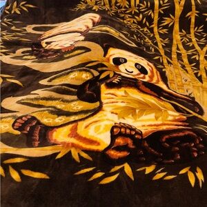 thick, plush, Korean-style "mink" blanket featuring a panda and bamboo design.